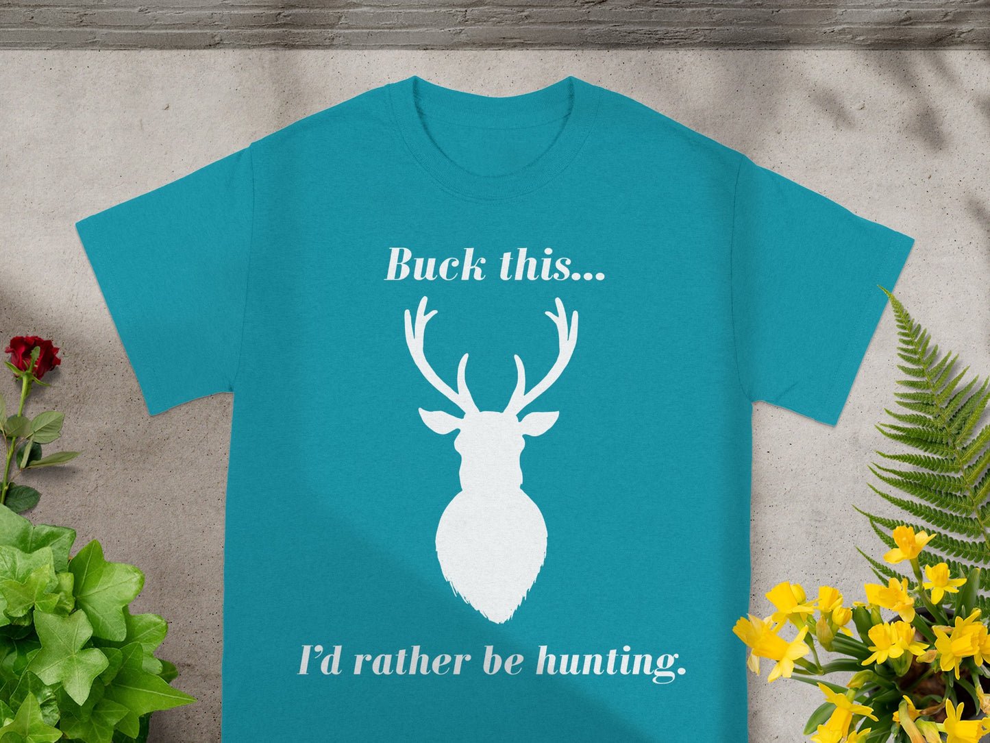 Teal t-shirt with white deer silhouette and text: "Buck this... I'd rather be hunting."