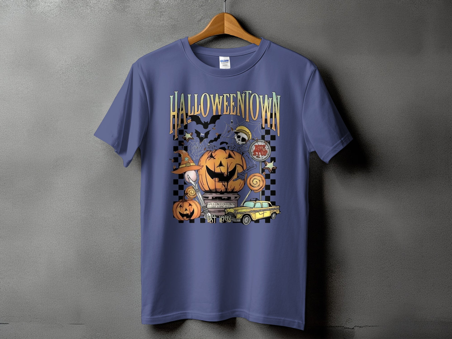 Halloweentown graphic with pumpkins, bats, and a yellow taxi, "Est 1998".