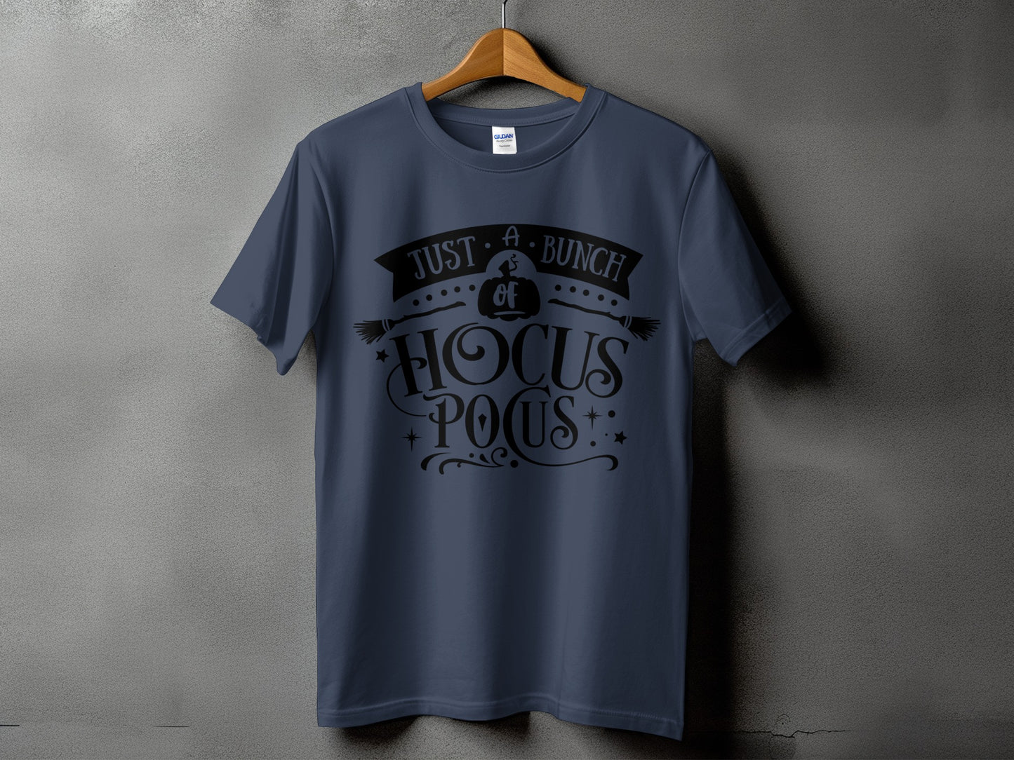 Blue t-shirt with black text reading "Just a bunch of Hocus Pocus" and graphics.