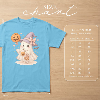Blue t-shirt with a kawaii ghost wearing a witch hat and holding Halloween treats. Includes size chart.