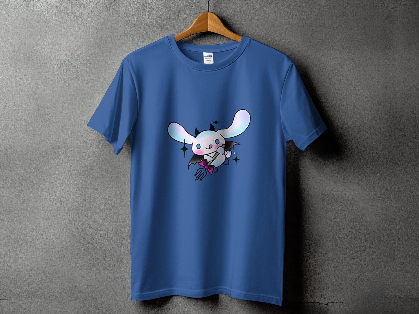Blue t-shirt with a cartoon character dressed as a devil, holding a trident.