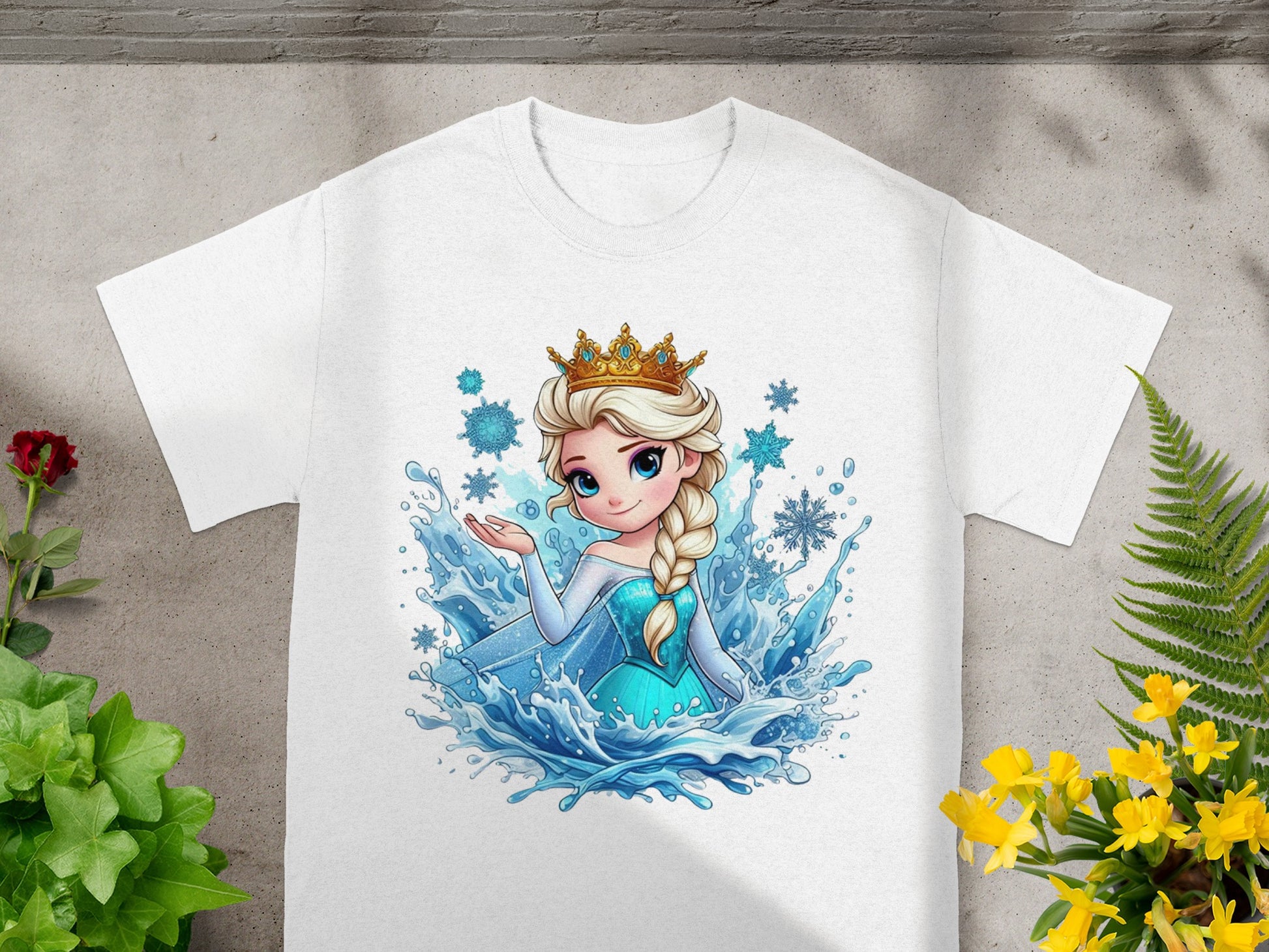 White t-shirt with Elsa from Frozen surrounded by water and snowflakes.