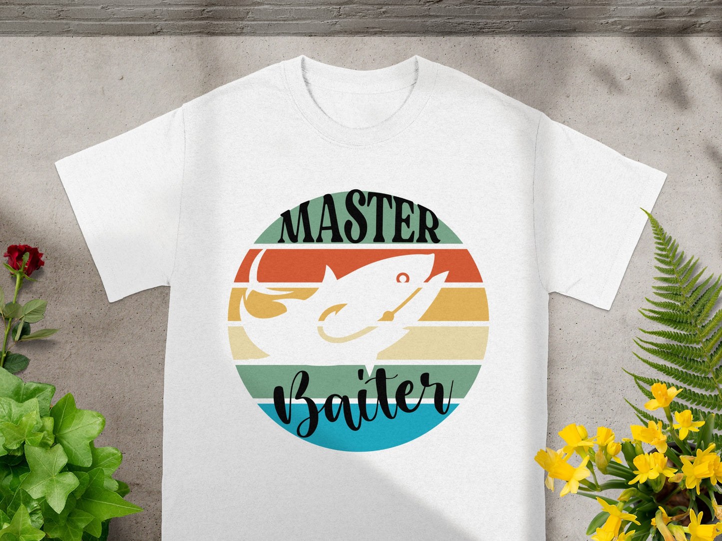 White t-shirt with "Master Baiter" text and fishing lure graphic on striped circle.