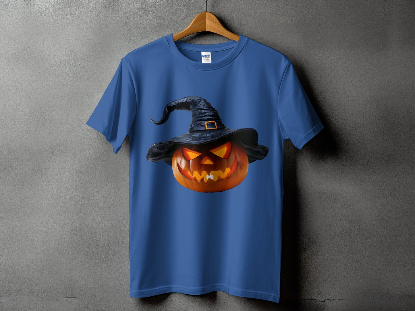 Blue t-shirt with a glowing jack-o'-lantern wearing a witch hat graphic.