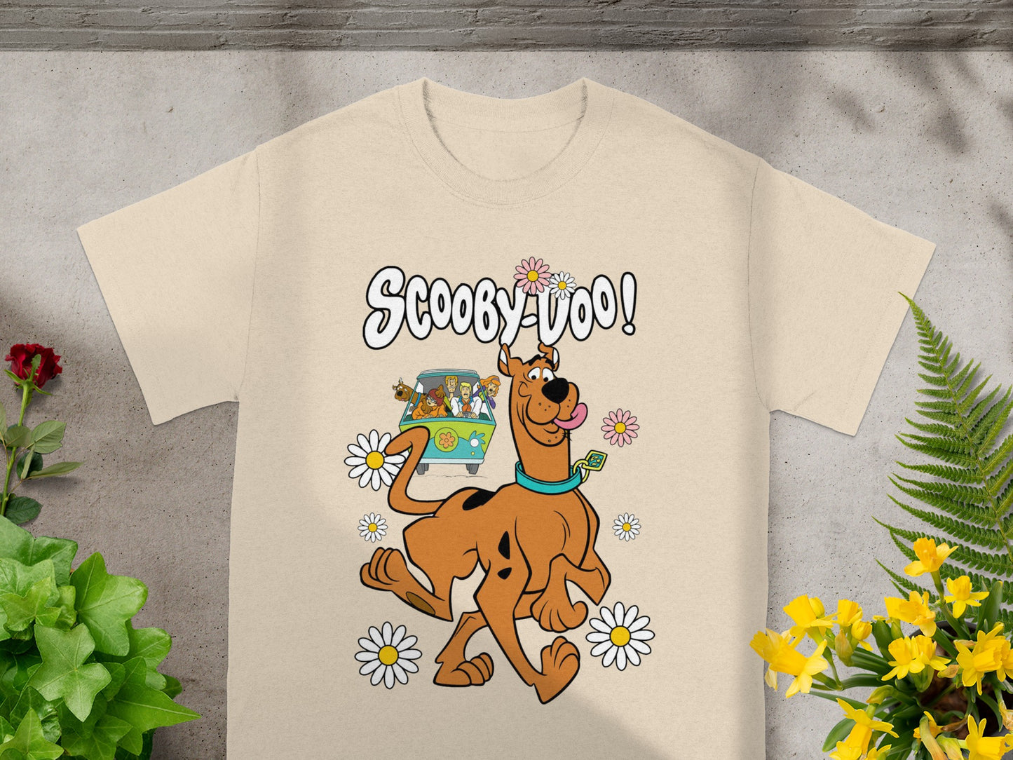 Scooby-Doo graphic on a tan t-shirt with Scooby and the Mystery Machine.
