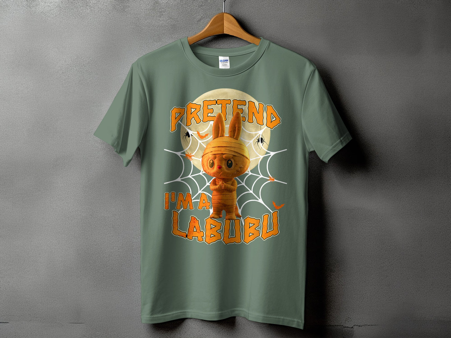 Green t-shirt with "PRETEND I'M A LABUBU" and mummy bunny graphic.