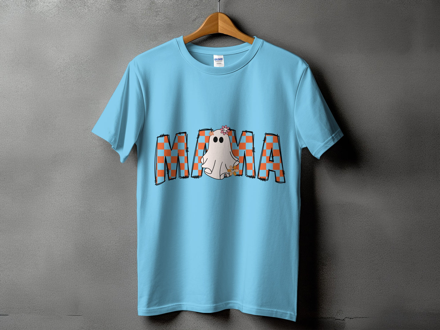 Light blue t-shirt with "Mama" text featuring a Halloween ghost and floral design.