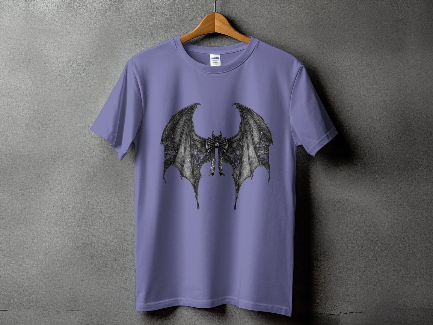 Purple t-shirt with detailed black bat wings and a bow graphic.