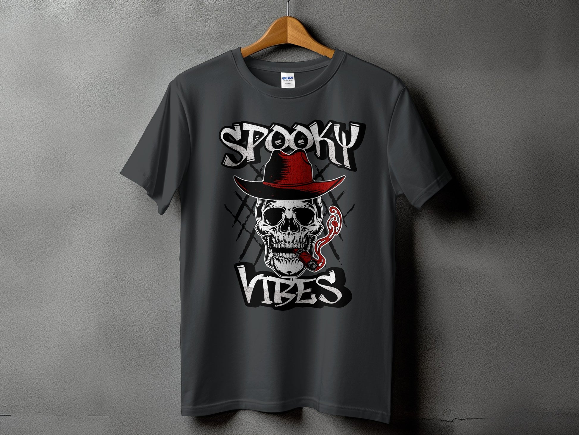Dark gray t-shirt with skull wearing a red hat and smoking a cigar, text "SPOOKY VIBES".