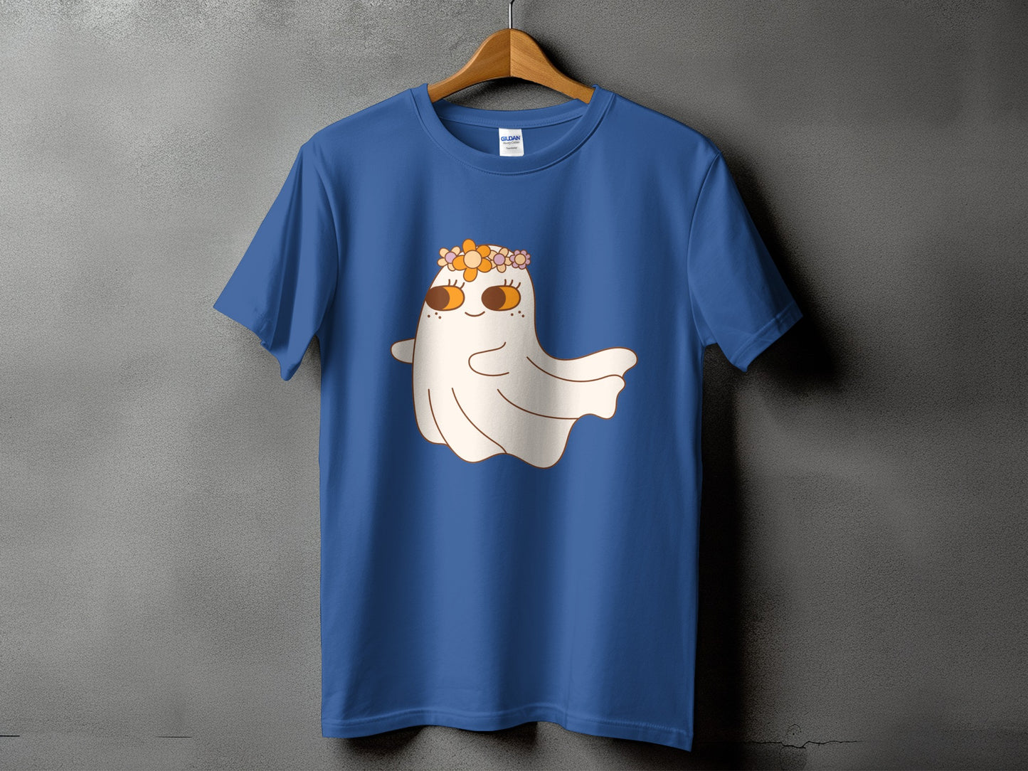 Blue t-shirt with a smiling ghost wearing a flower crown.