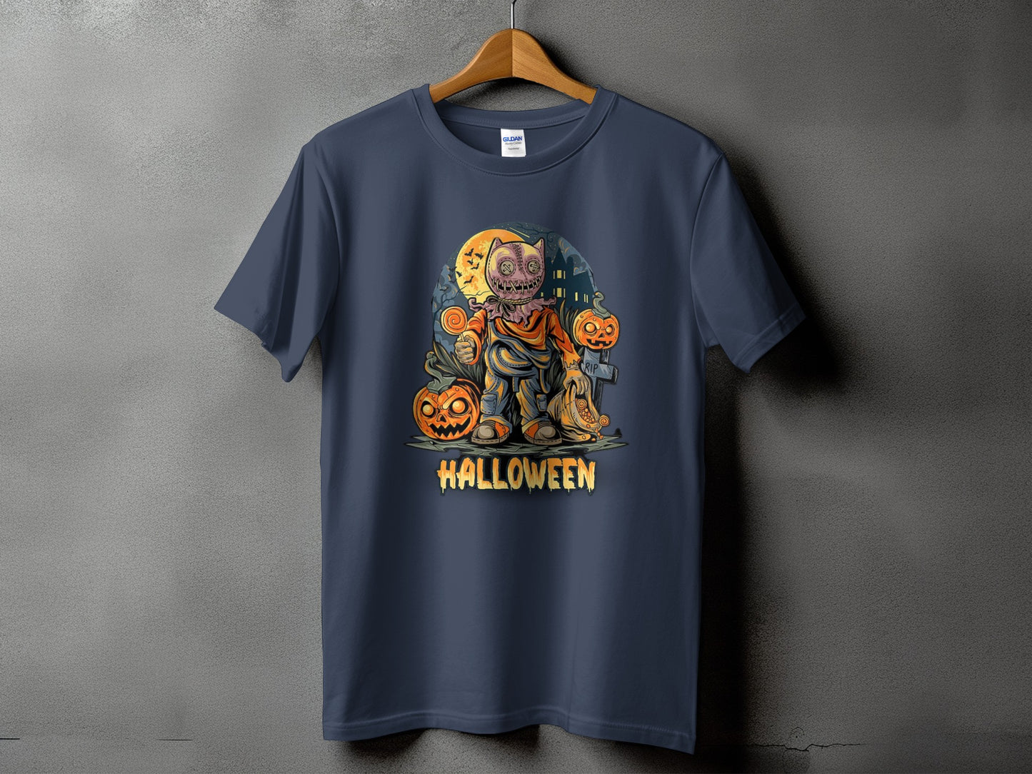 Dark blue t-shirt with a Halloween scarecrow and pumpkins graphic and text.