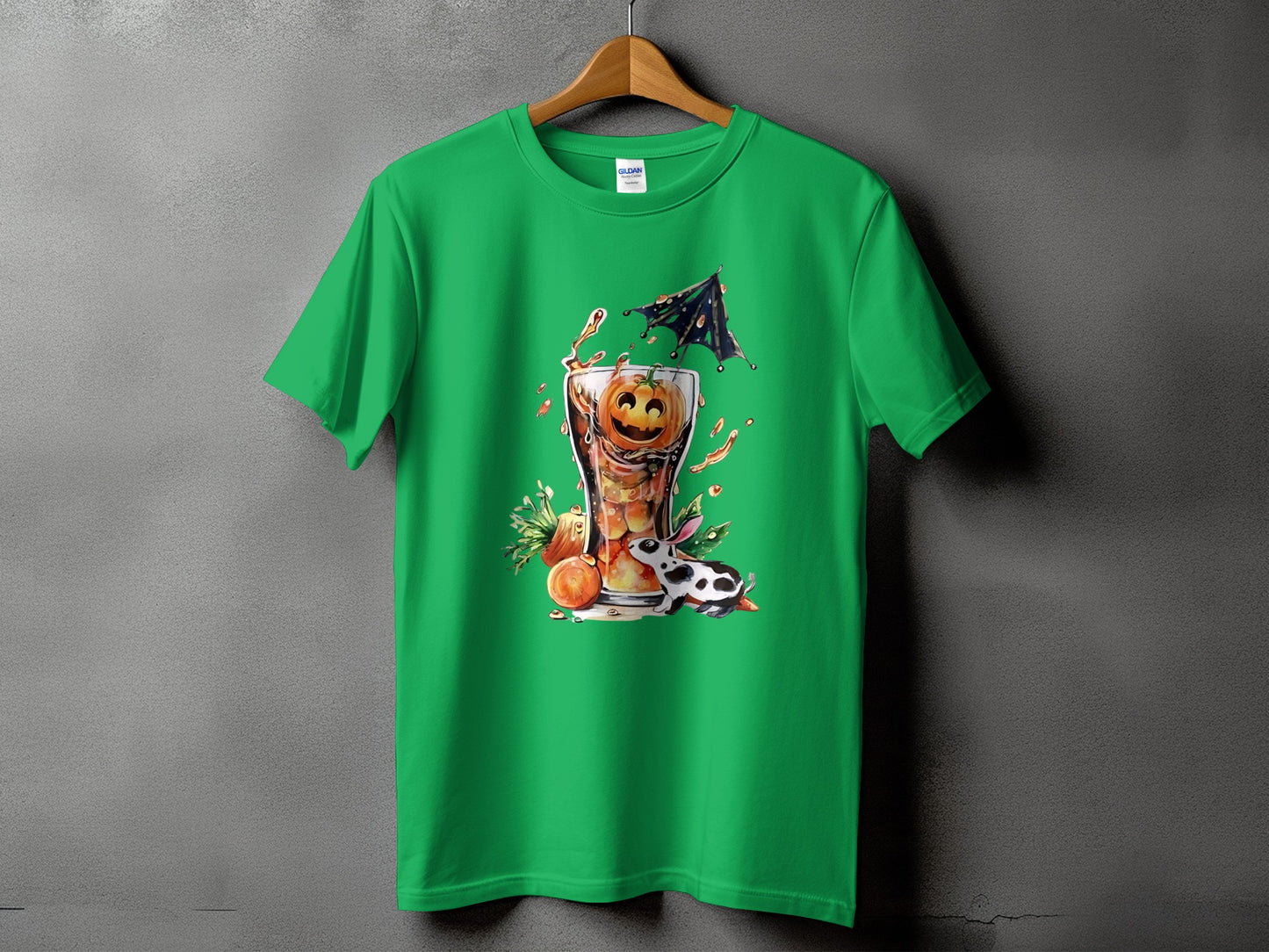 Green t-shirt with Halloween drink, pumpkin, and spotted rabbit graphic.