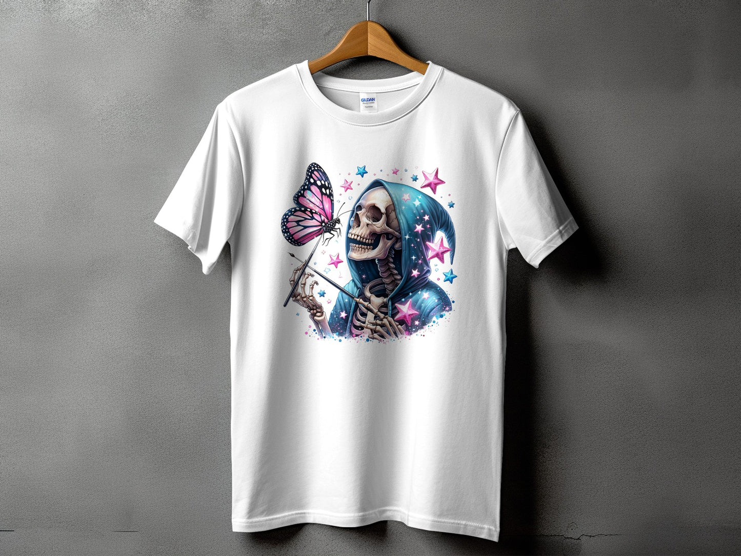 Skeleton grim reaper with pink butterfly and starry blue hoodie on white t-shirt.