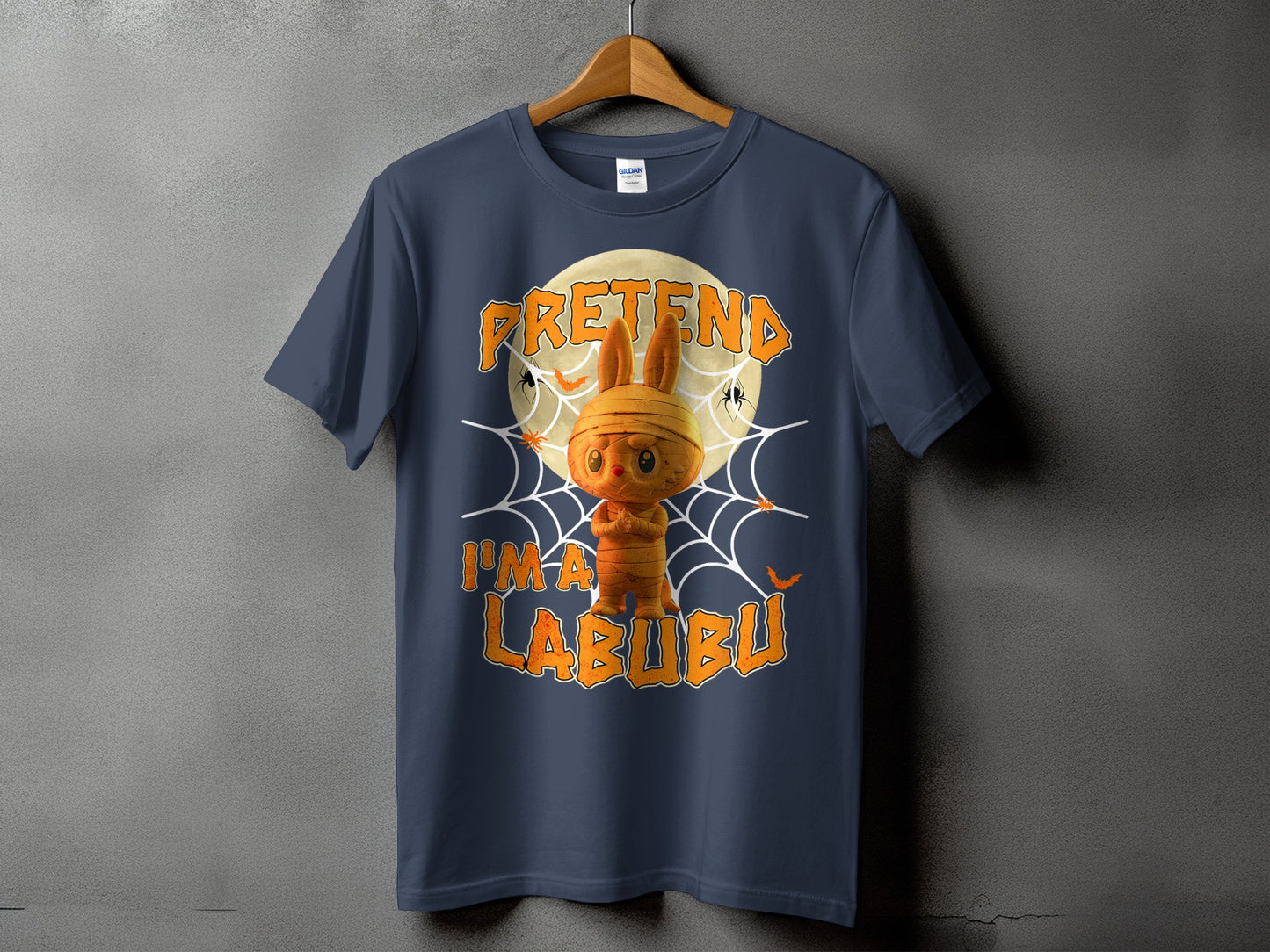 Dark blue t-shirt with Halloween mummy bunny graphic and text "PRETEN I'M A LABUBU".