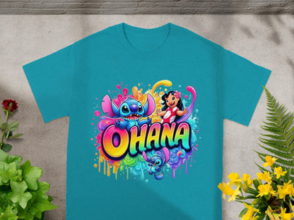 "Ohana" graphic with Stitch and Lilo in colorful paint splatter on a turquoise t-shirt.