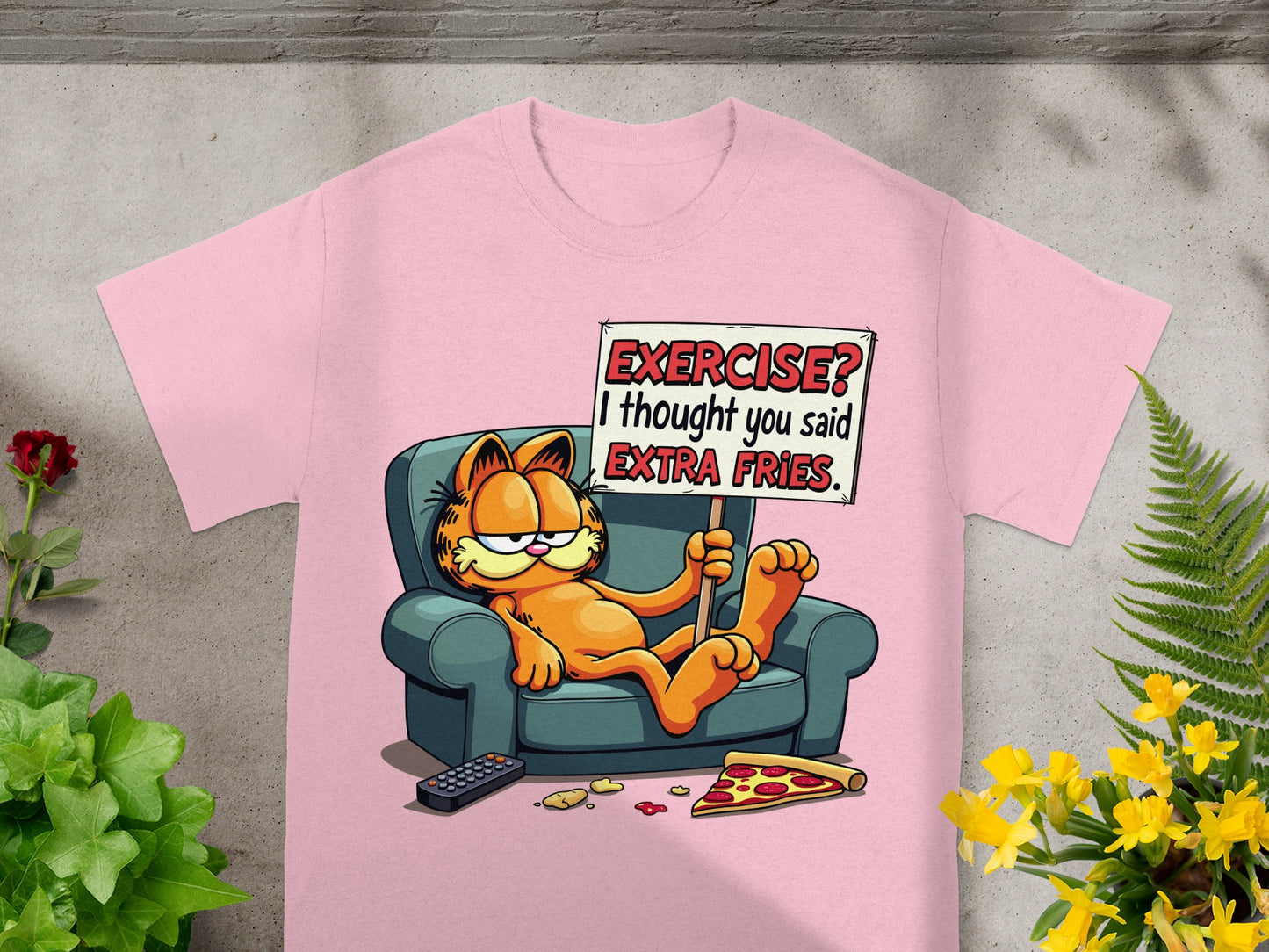 Pink t-shirt with Garfield lounging, holding a sign: "Exercise? I thought you said EXTRA FRIES."
