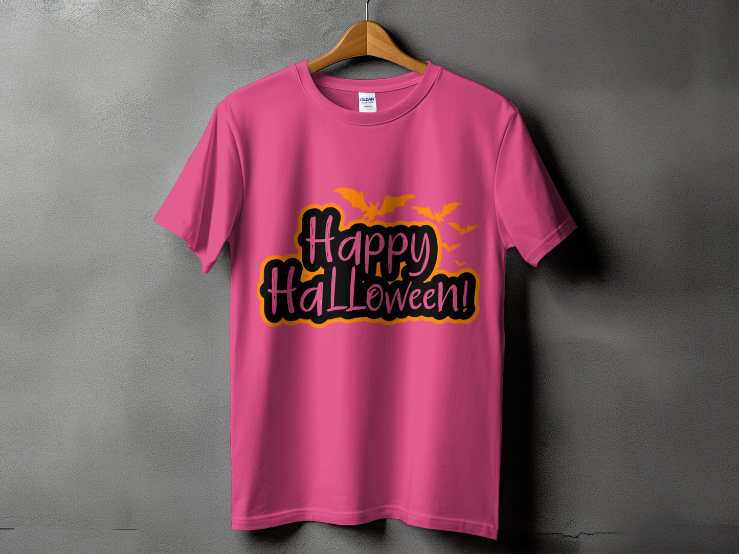 Pink t-shirt with "Happy Halloween!" text and orange bats design.
