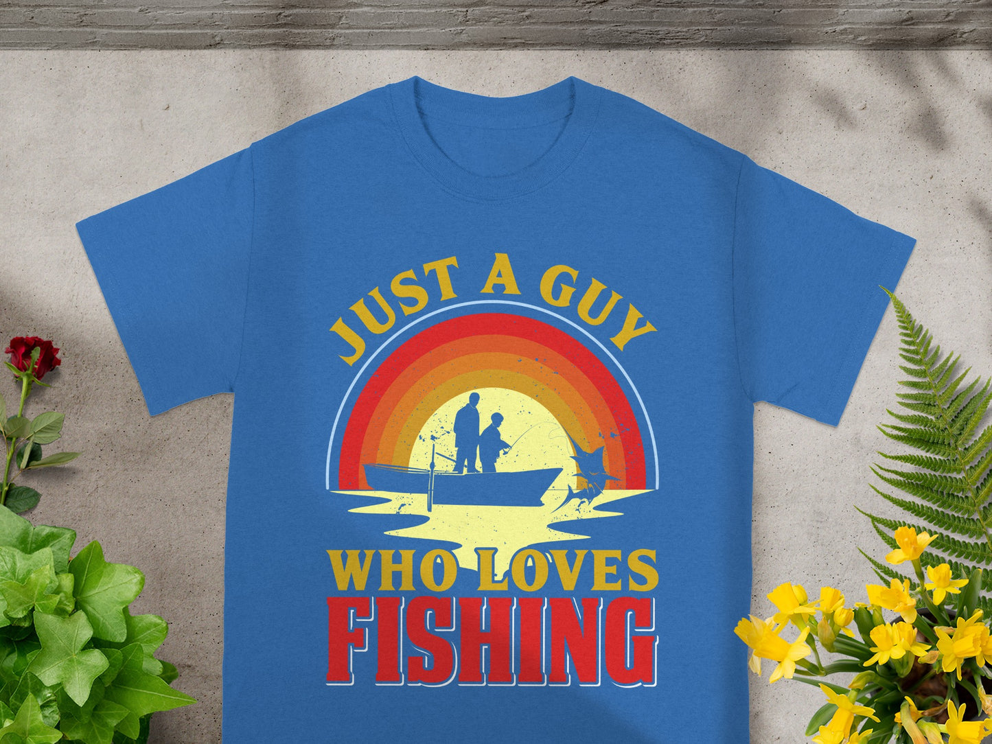 Blue t-shirt with "Just a Guy Who Loves Fishing" text and graphic.