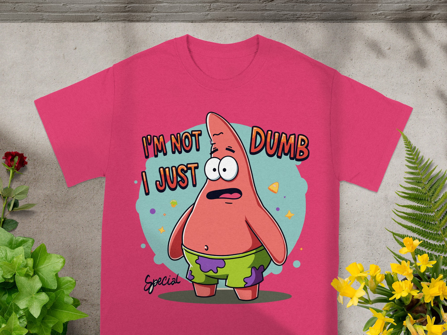 Pink t-shirt with Patrick Star graphic and "I'M NOT DUMB I JUST SPECIAL" text.