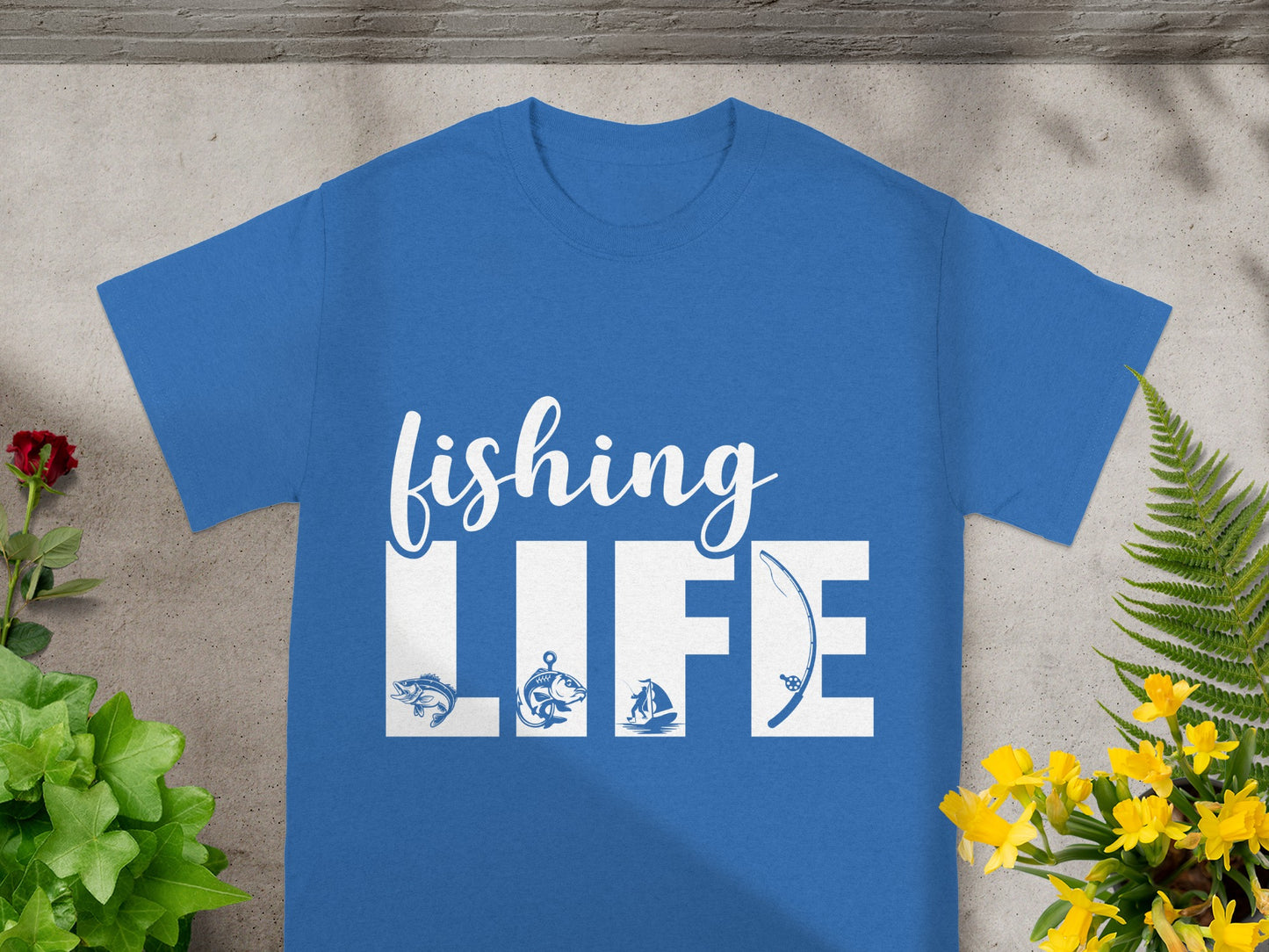 Blue t-shirt with white "fishing LIFE" text and fishing-themed graphics.