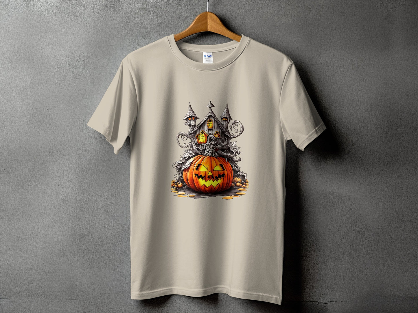 T-shirt featuring a Halloween graphic of a jack-o'-lantern and haunted house.