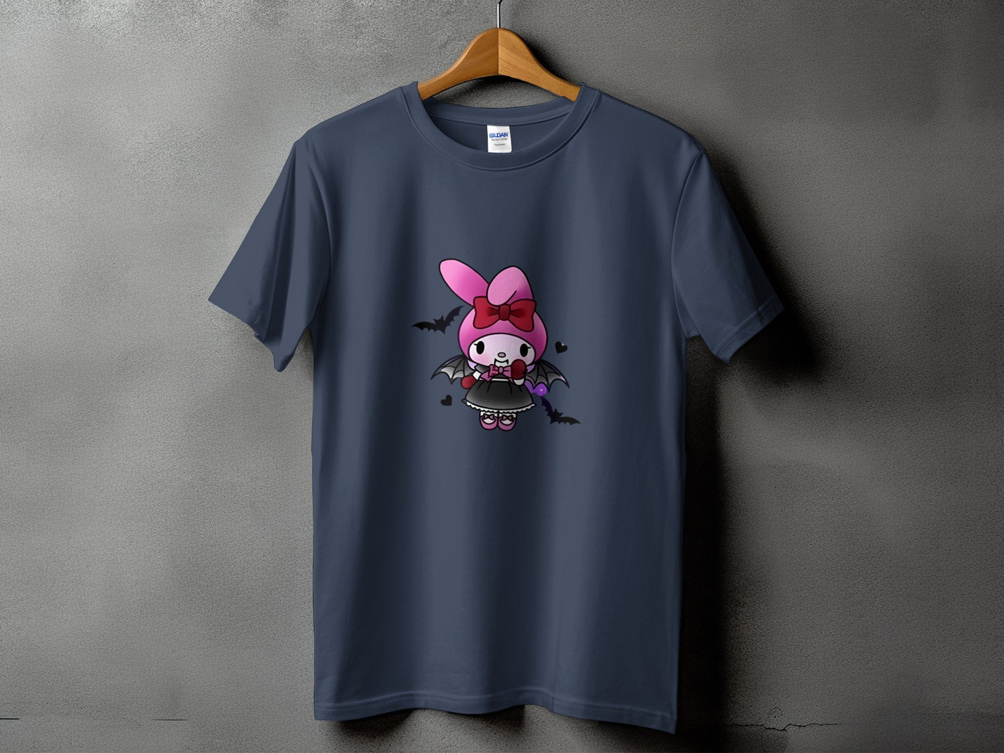 Dark gray t-shirt featuring a cartoon character with bunny ears, a bow, and bat wings.