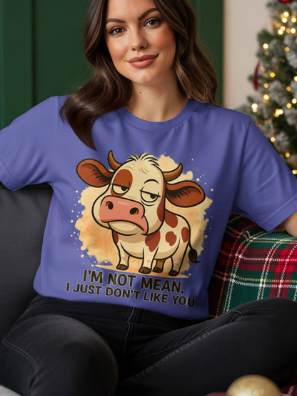 Purple t-shirt with a grumpy cow illustration and text "I'm not mean, I just don't like you."