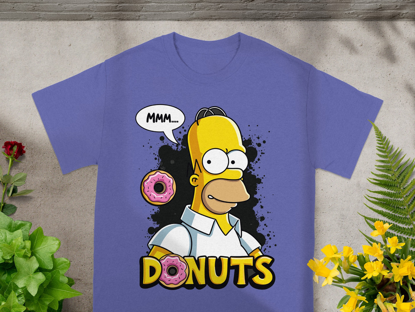 Homer Simpson saying "MMM...." with "DONUTS" text and donut graphics.