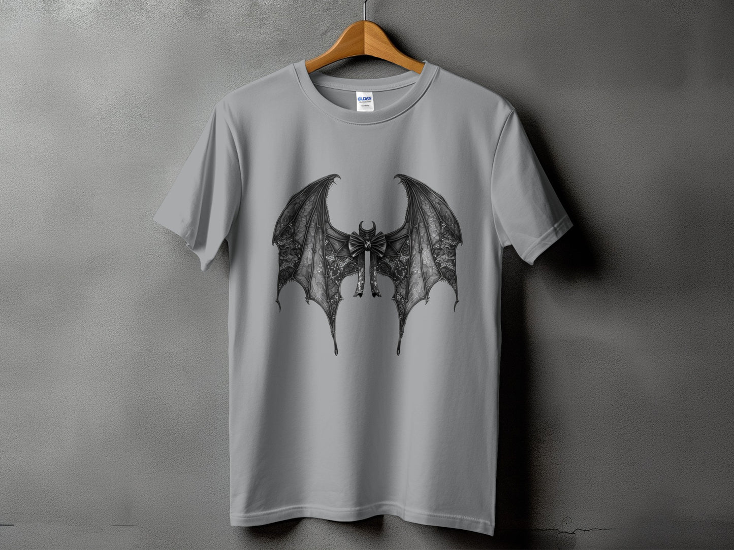 Grey t-shirt with black gothic bat wings and bow graphic.