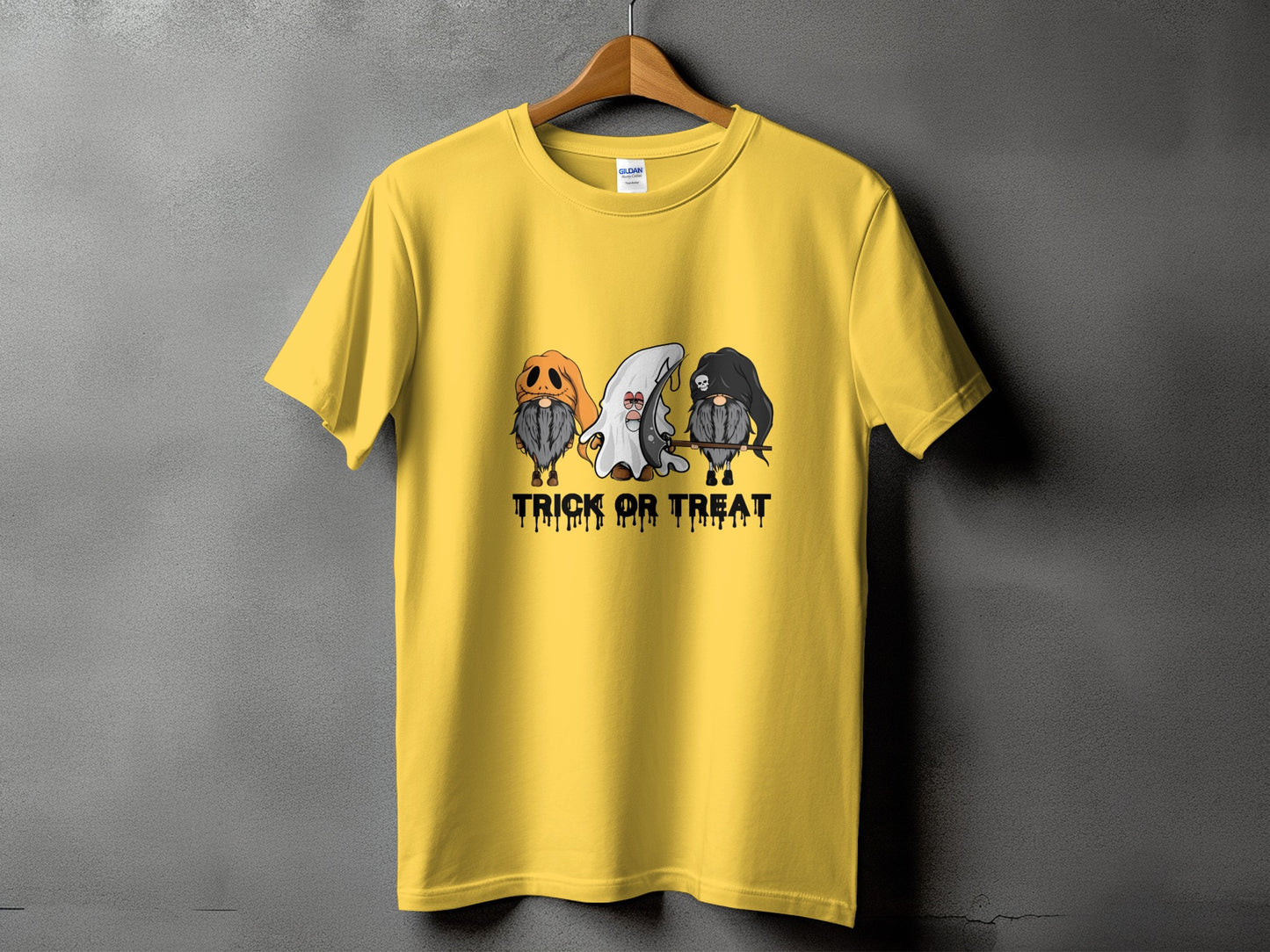 Yellow t-shirt with three cartoon gnomes and "Trick or Treat" text.