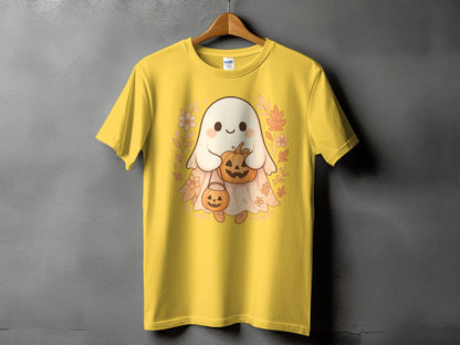 Yellow t-shirt with a cute ghost holding pumpkins, surrounded by fall foliage.
