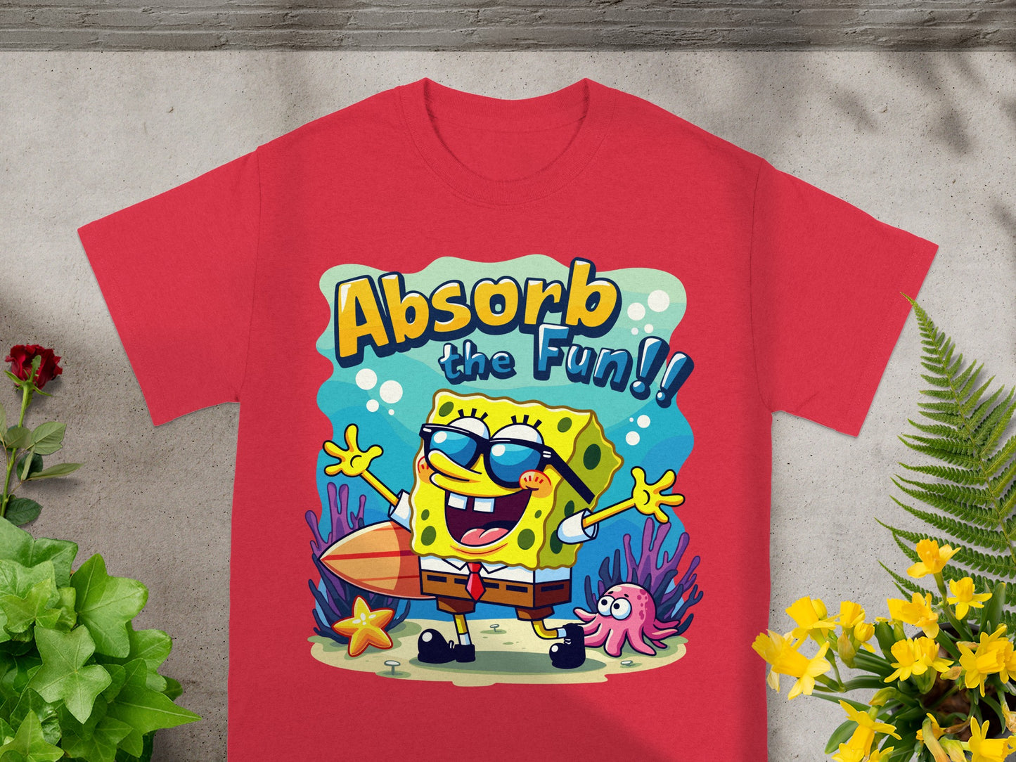 Red t-shirt with Spongebob Squarepants wearing sunglasses and saying "Absorb the Fun".