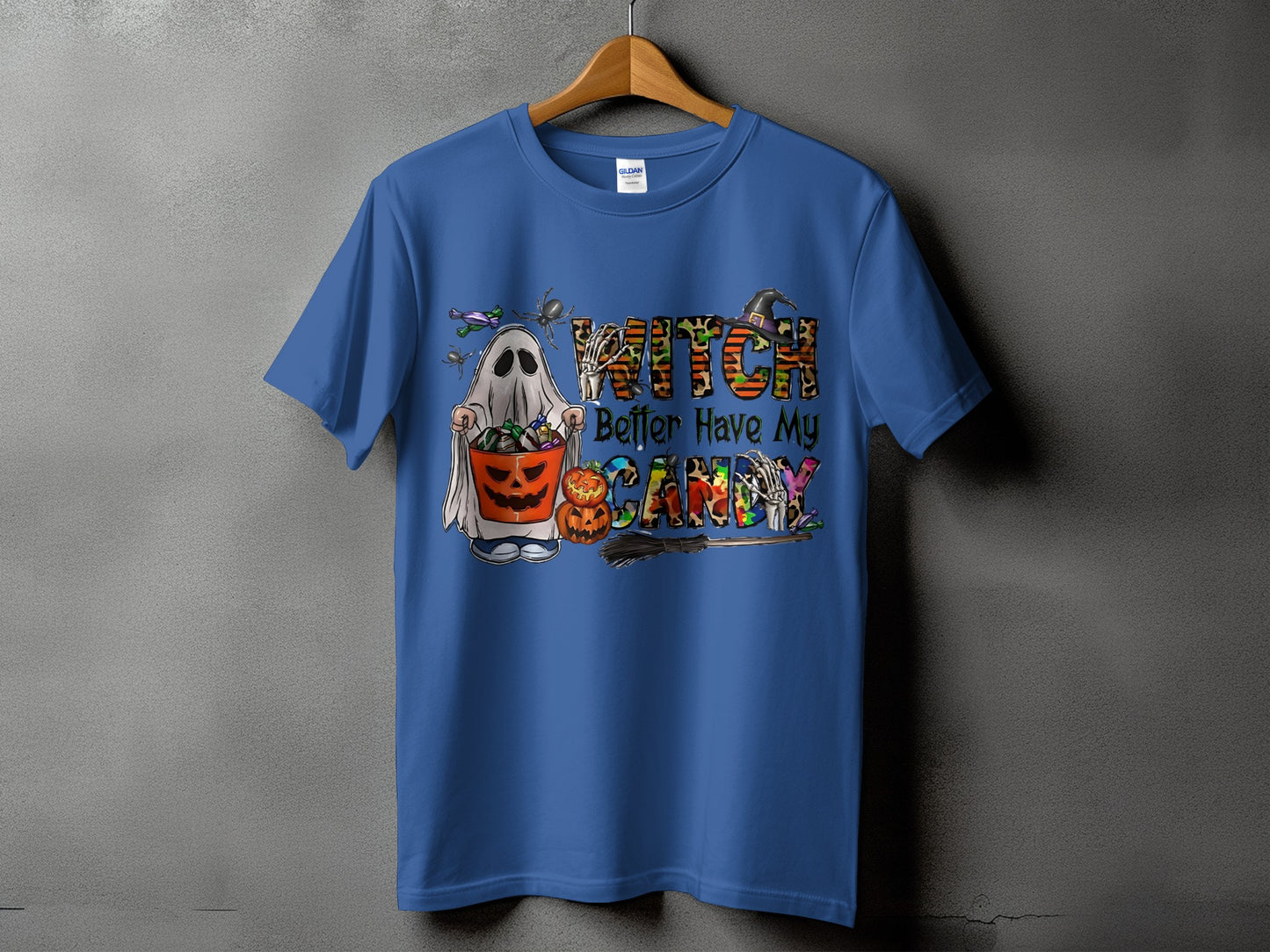 Blue t-shirt with ghost, pumpkin bucket, and "Witch Better Have My Candy" Halloween graphic.