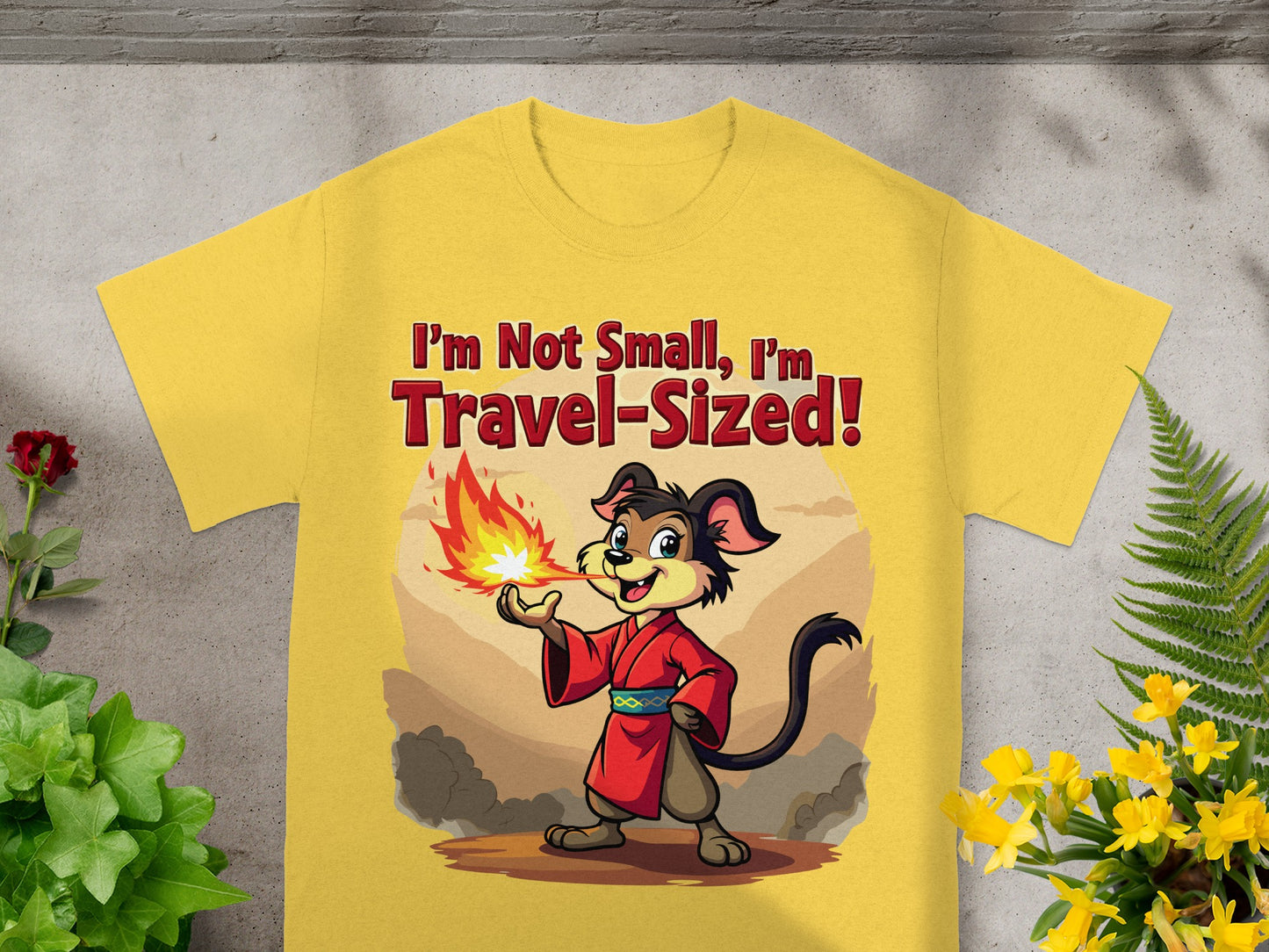 Yellow t-shirt with cartoon dog saying "I'm Not Small, I'm Travel-Sized!".