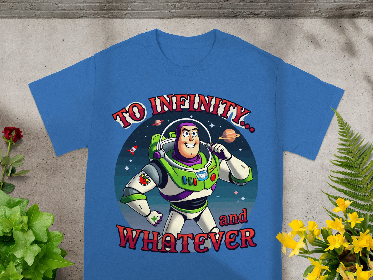 Blue t-shirt with Buzz Lightyear and text "TO INFINITY... and WHATEVER".