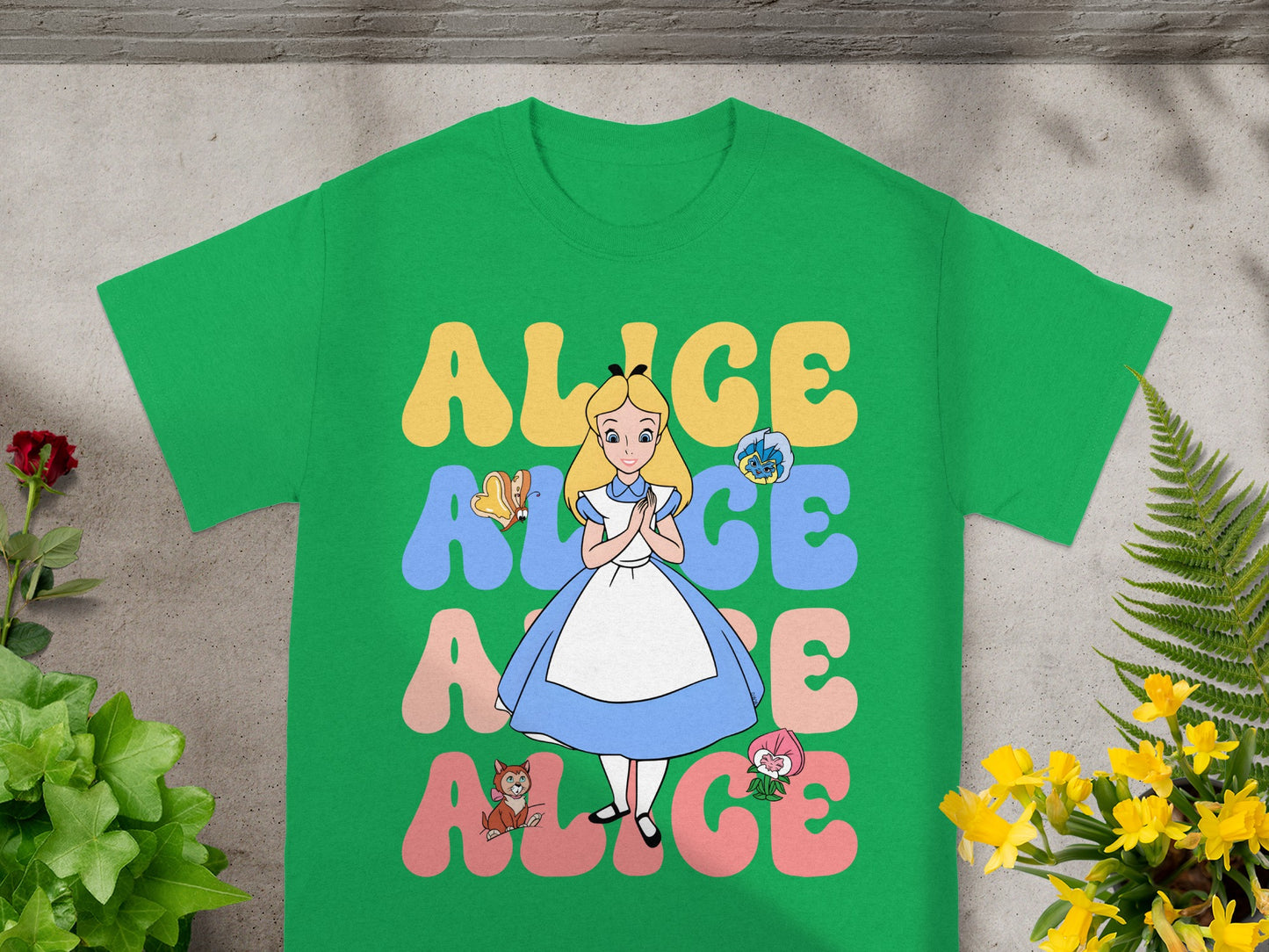Green t-shirt with "Alice" in colorful bubble letters and Alice character.
