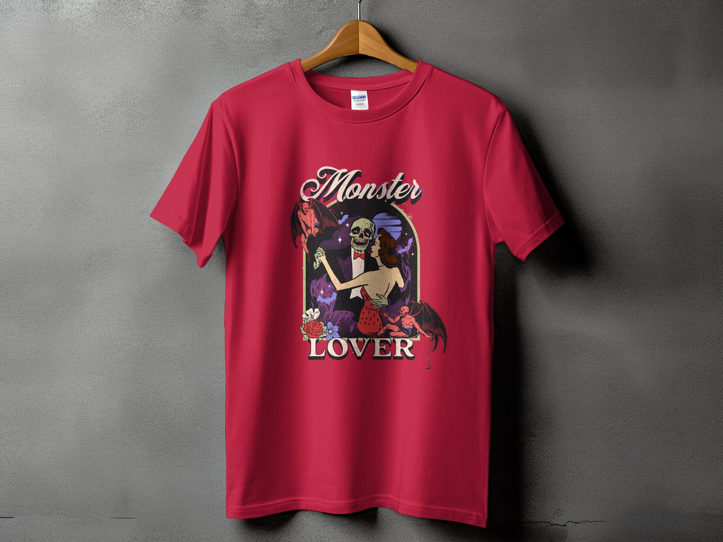 Red t-shirt with "Monster Lover" graphic featuring a skeleton and winged figures.
