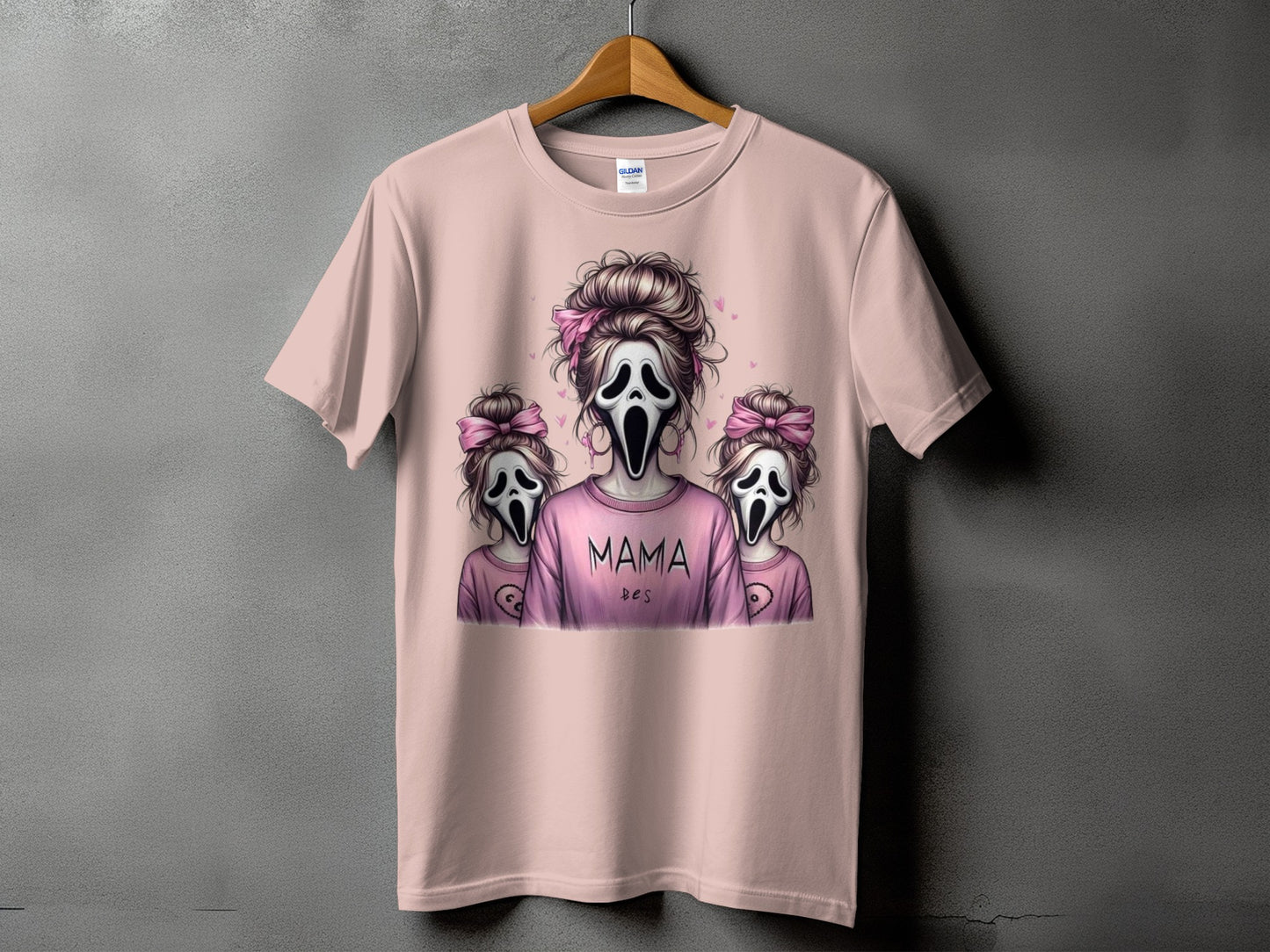 Pink t-shirt with "Mama" text and three ghost figures wearing bows.