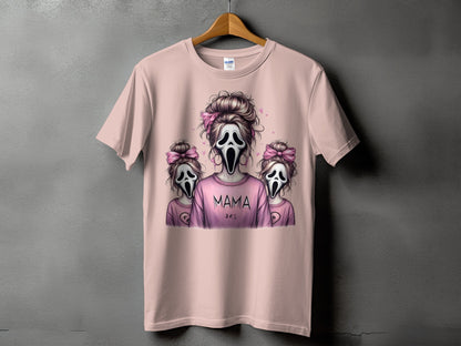 Pink t-shirt with "Mama" text and three ghost figures wearing bows.